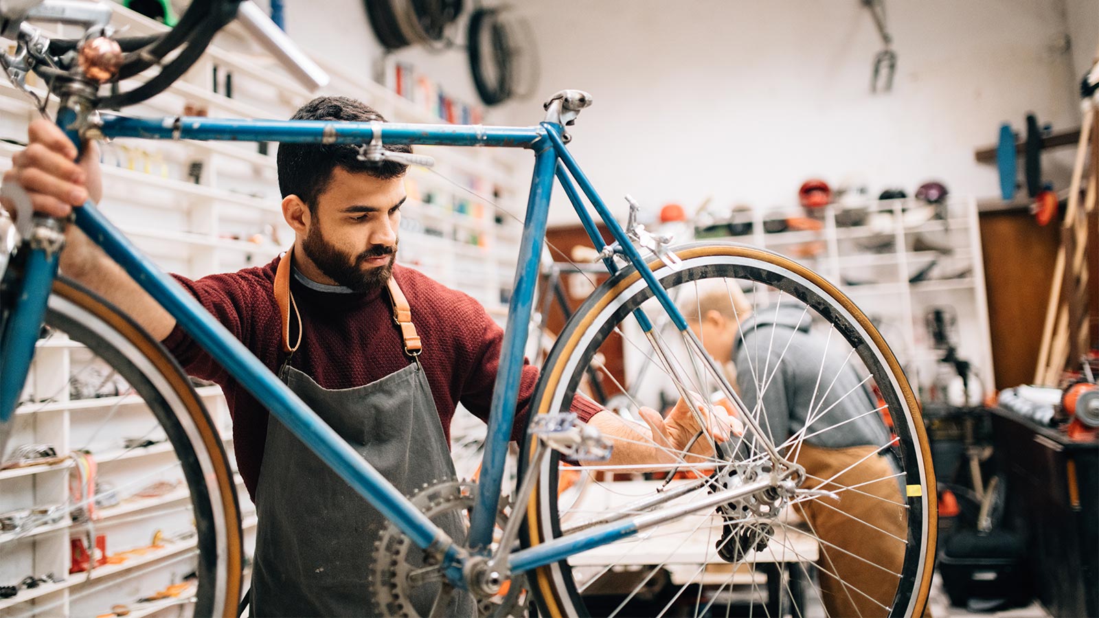 man working on bike